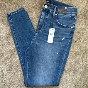 Express Blue Skinny Jeans with Distressed Details